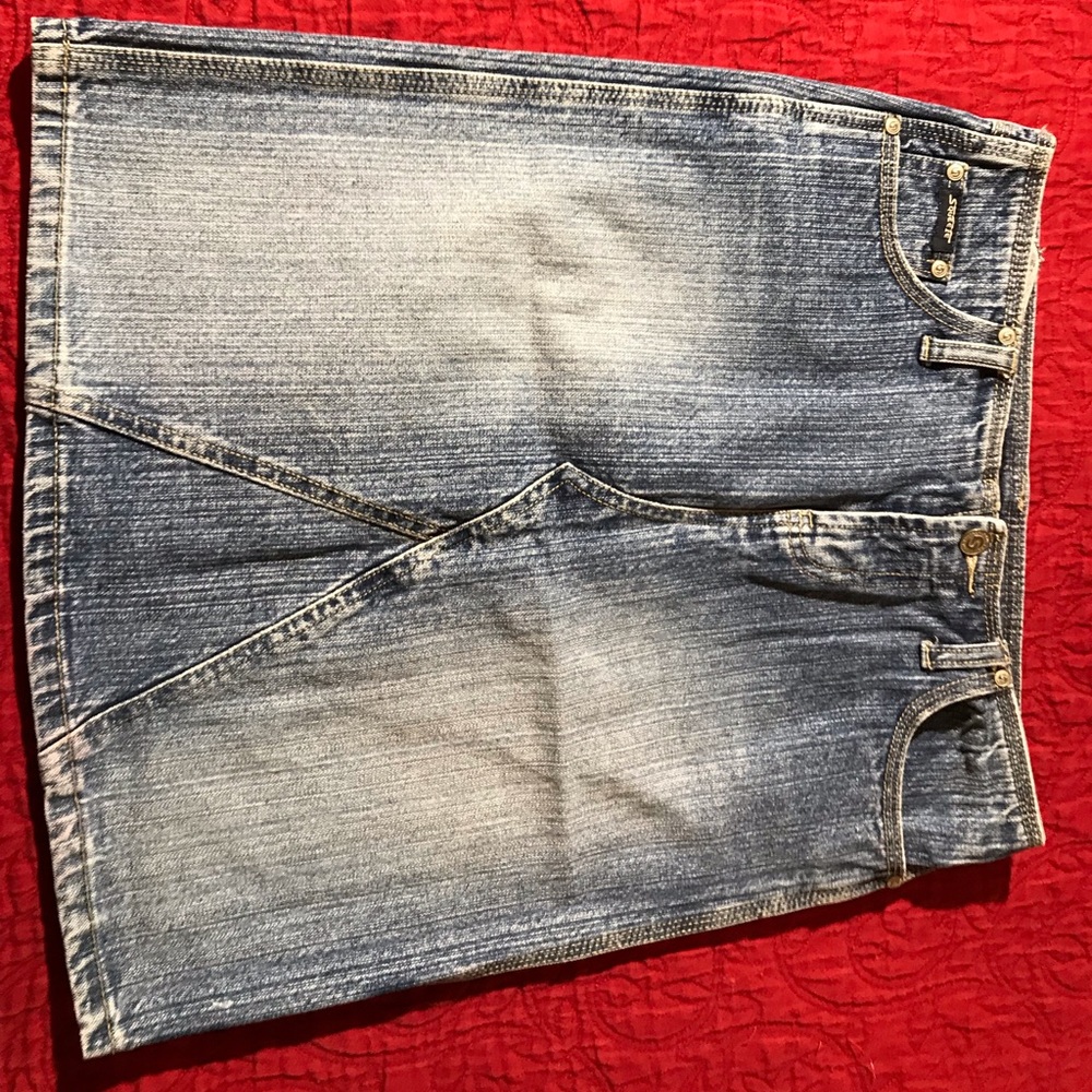 Squeeze denim mini skirt.  Size 5.  Super cute!